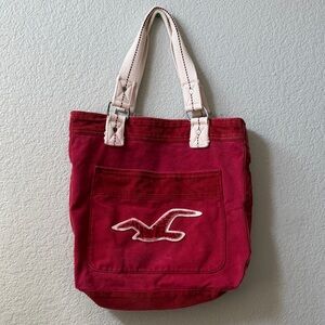 Red Hollister tote bag with white accents with corduroy texture